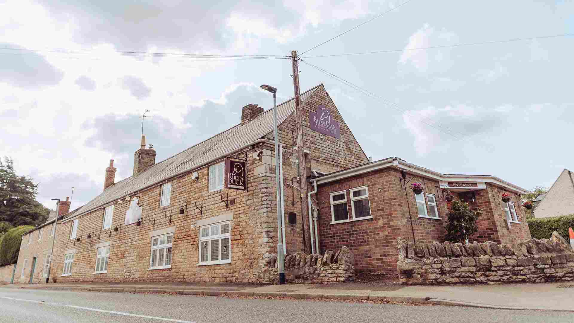 Ruddy Duck, Peakirk - A wide angled view of the pub from outside
